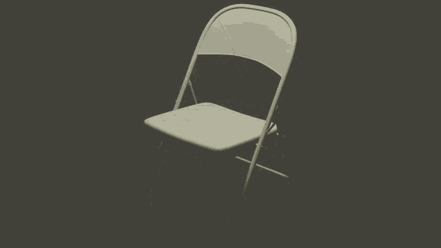 A dramatic rotating folding chair